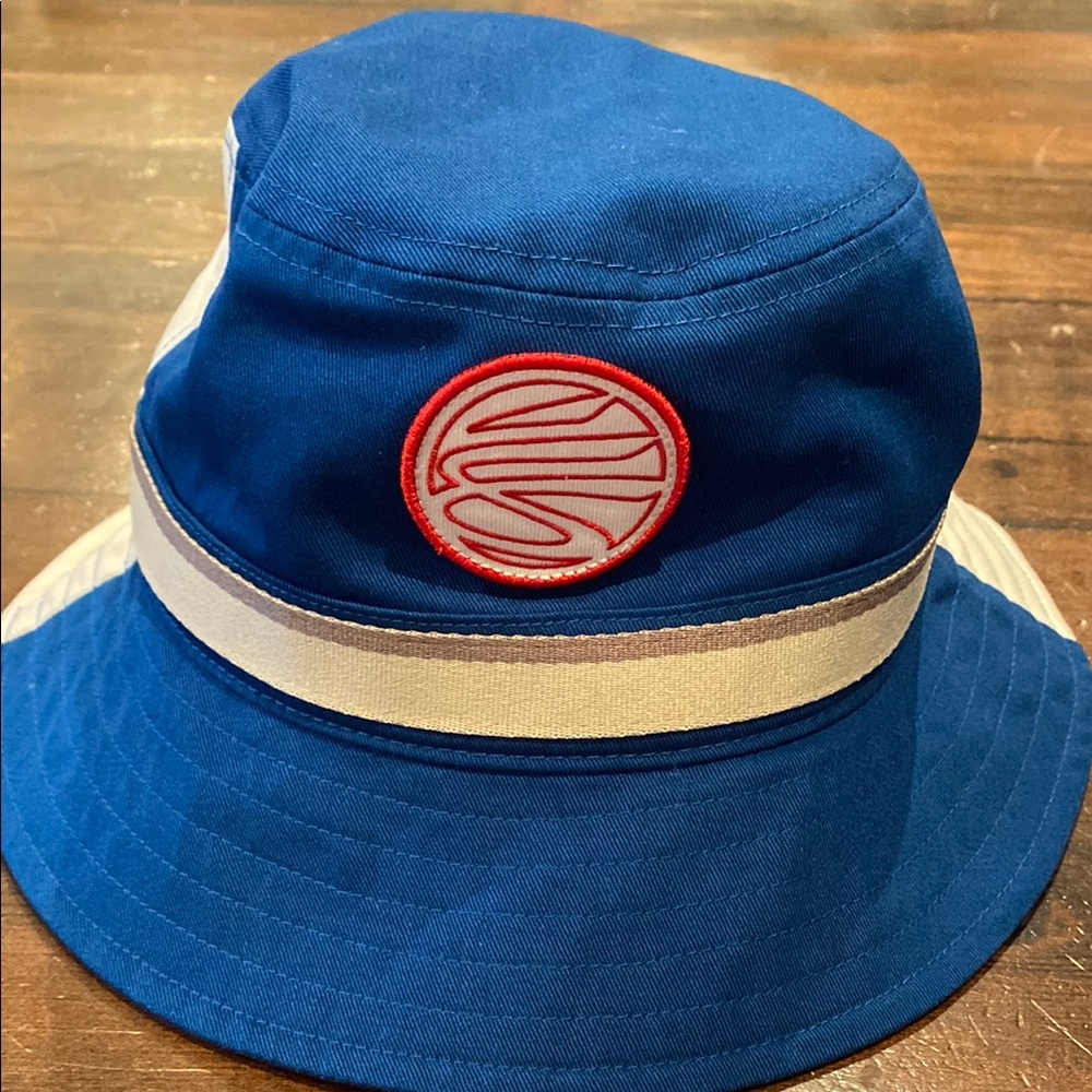 Curry branded Blue Bucket Hat with Red Logo. New no tags